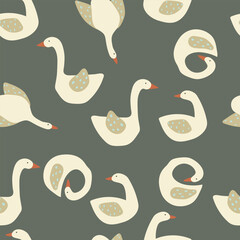 Hand drawn cute swans in different poses on green background. Vector illustration with animals.