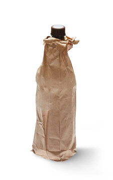 Bottle of beer in a paper bag isolated on transparent background