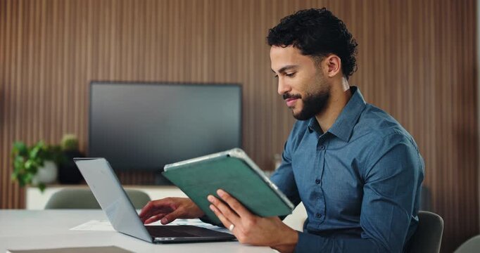 Businessman, typing and tablet in office with laptop for financial statement, audit check and report. Person, review and reading in workplace with tech, computer or finance evaluation for accounting.