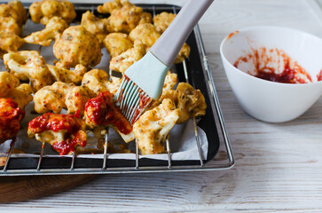 Buffalo cauliflower in batter with buffalo sauce
