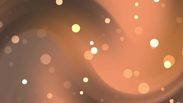 Abstract orange bokeh background with swirling light patterns