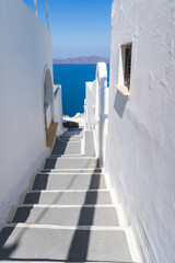 Steps down to the Agean Sea and towards the volcano, Fira, Santorini, Greece