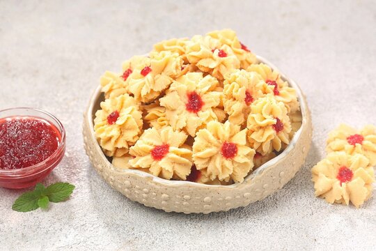 Semprit mawar or biskut semperit dahlia are a traditional cake popular during Eid Al Fitr. These cookies are shaped like roses
