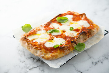 Traditional pizza with tomato sauce and mozzarella