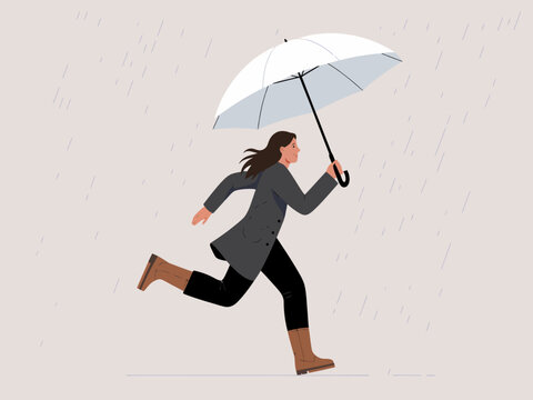 A woman in a coat and boots runs through the rain while holding an umbrella, showcasing resilience in adverse weather conditions and capturing a dynamic moment.