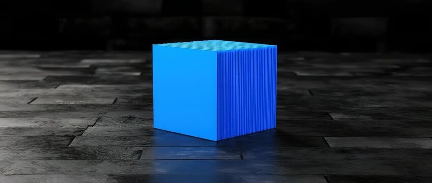 Bright blue cube structure composed of many vertical fins stands on a dark textured surface
