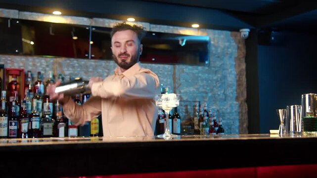 Professional bartender making cocktails step by step in a modern bar. Includes pouring, shaking, stirring, garnishing, and serving drinks. Perfect for food and beverage content