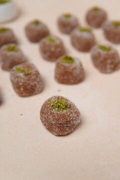 Kandi Pedha is a traditional Indian sweet made using fresh sugarcane juice (kandi), slowly reduced and cooked to achieve a rich, caramelized flavor. Known for its natural sweetness, soft texture, and 
