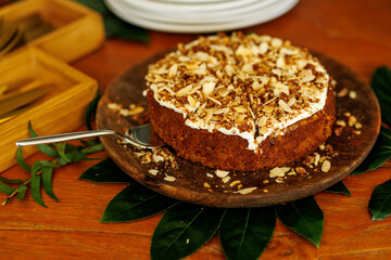Homemade Cake With Cream Topping and Almond Crumble