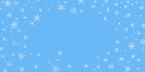 Snowfall. Falling white lacy snowflakes on a blue background.