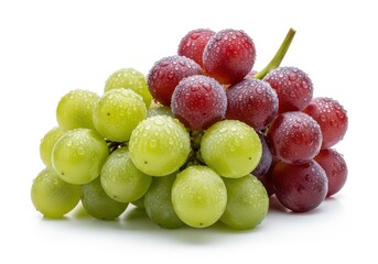 Cluster of green and red ripe fruit berries coated with fresh water droplets rests on a white surface