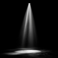 Single spotlight beams down in dark void, creating a circle of light below