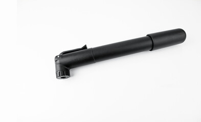 Small mini bicycle pump on a white