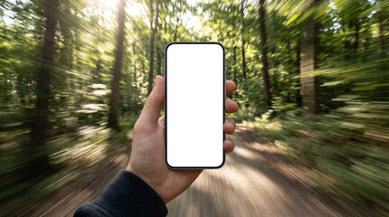 Action-focused vertical smartphone mockup held by a hand on a sunlit forest trail. Motion blur background conveys speed, adventure, navigation, and outdoor activities.