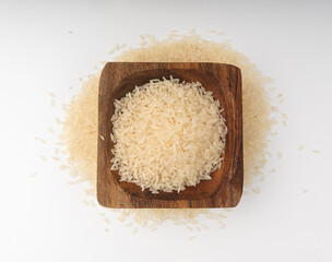 White parboiled rice grains. Dry uncooked ponni rice, small organic basmati