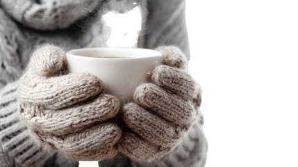 Woman's Hands Holding a Steaming Cup in Cozy Knitted Gloves isolated on white background