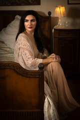 Young brunette in nightgown