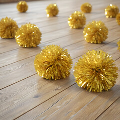 golden pompoms on a wooden floor