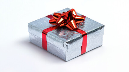Fototapeta premium Shiny silver gift box adorned with vibrant red bow and ribbon, perfect for celebrations and special occasions