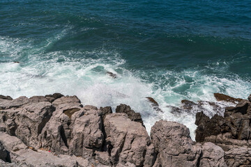Blue Mediterranean Sea with Rock Background