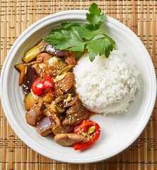 Plate of rice with chicken vegetables and fried rice with pork served as a delicious meal