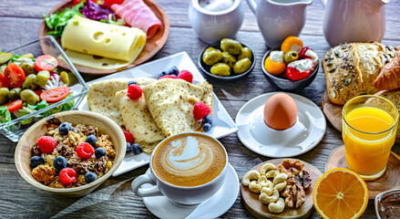 Breakfast served with coffee, juice, croissants and egg
