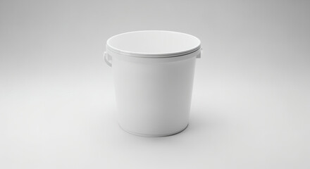A monochrome studio shot features a cylindrical, white plastic container with a handle, set against a plain backdrop