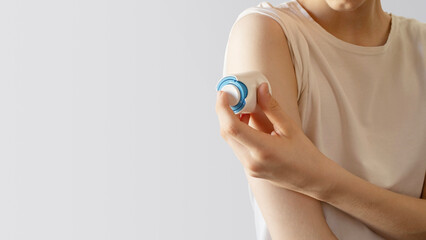 Teenager Installing Glucose Monitor Sensor on Arm. Modern Concept of Tech-Driven Health Control, Autonomous Health Tracking, and Innovative Diabetes Management for Medical Visuals and Social Awareness