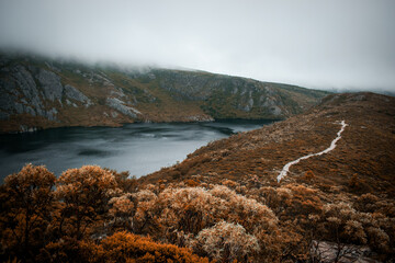 Australia, the dramatic Crater Lake in Tasmania was created when glacial snow and ice gouged out a crater-like hollow, that's now filled with water. This stunning lake is definitely worth visiting!