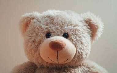 Obraz premium Close up portrait of a plush teddy bear with soft fur texture, gentle facial expression, light pastel background, minimal composition, emotional