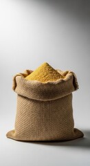 Organic animal feed granules in burlap sack for livestock and poultry nutrition. Agricultural fodder