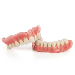 Fototapeta premium Pink Denture Set with White Teeth on White Background dentures dental