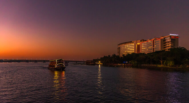 Fort kochi, Kerala. India. November 02,2025: Night view of Grand Hyatt 5 star hotel with cruise ship anchoring.