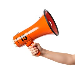 Fototapeta premium Orange megaphone bullhorn held by a hand for communication
