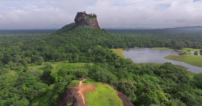 Aerial View of Sigiriya Lion Rock and Lake Surrounded by Tropical Jungle, Sri Lanka