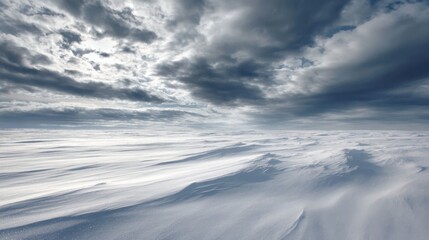 Wide winter tundra with wind shaped snow patterns, dramatic clouds overhead, cold neutral palette, abstract natural geometry, cinematic winter scenery
