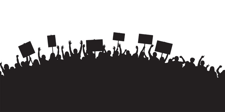 Crowd of protesters holding signs and raising fists in solidarity.