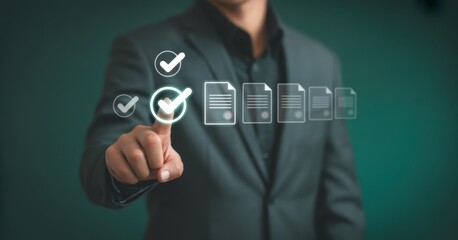 Businessman validating digital documents with green check mark symbol. Concept of certification, approval process and digital verification in business or compliance operations.