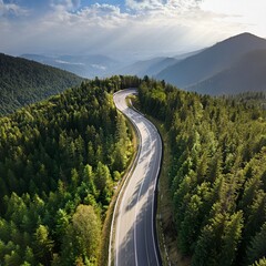 Aerial View of Scenic Winding Mountain Road Through Dense Green Forest, Curved Highway Landscape in Summer Nature, Drone Photography of Serpentine Road in Hills, Travel and Transportation Concept