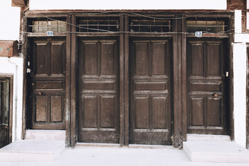 an old wooden door on the street