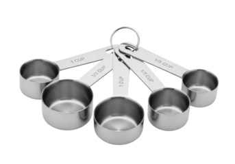 Four polished silver stainless steel measuring cups, fanned out in a dynamic low-angle composition on a transparent background, showcasing macro detail and sharp focus. Concept of culinary precision