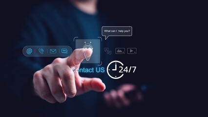 Hand touching virtual AI chatbot interface with contact icons and 24 hours 7 days support symbol, representing digital customer service, automation, online help desk and modern technology assistance.