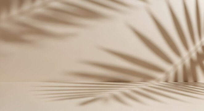 Abstract background with blurred palm leaf shadow on beige wall, creating a soft and natural backdrop for product presentation and tropicalthemed designs
