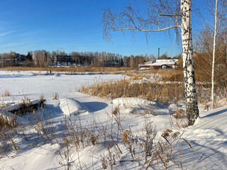 Russia, Chelyabinsk region. Lake Uvildy in cloudy January day