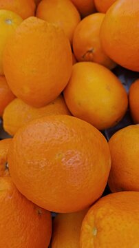 Citrus Delight: A vibrant pile of juicy oranges, radiating freshness and the promise of a zesty, vitamin-packed treat.