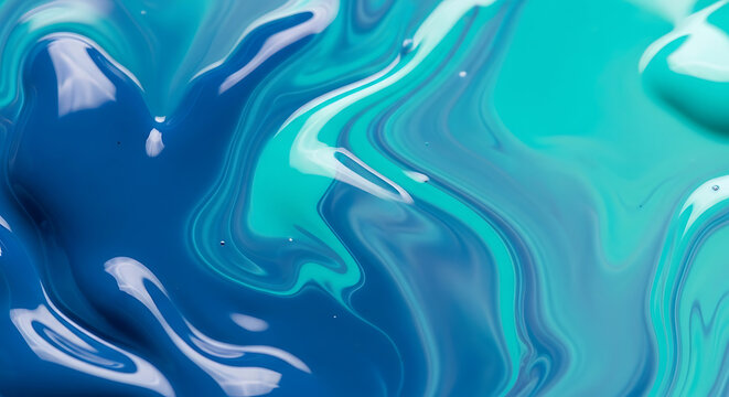 A mesmerizing closeup of swirling blue and turquoise paint creates an abstract and fluid texture, perfect for backgrounds, wallpapers, or artistic projects, showcasing the beauty of color mixing and m