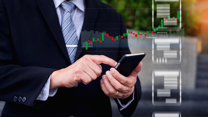 Businessman using smartphone analyzes stock market data and financial charts for global investment strategy and business growth stock market forex trading fintech