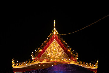 The roof of the buddhist temple at night, Thailand.