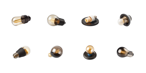 Collection of various energy efficient led and vintage style filament light bulbs with different bases on transparent background