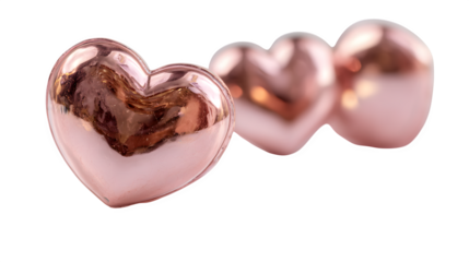 Polished rose gold hearts isolated on transparent background